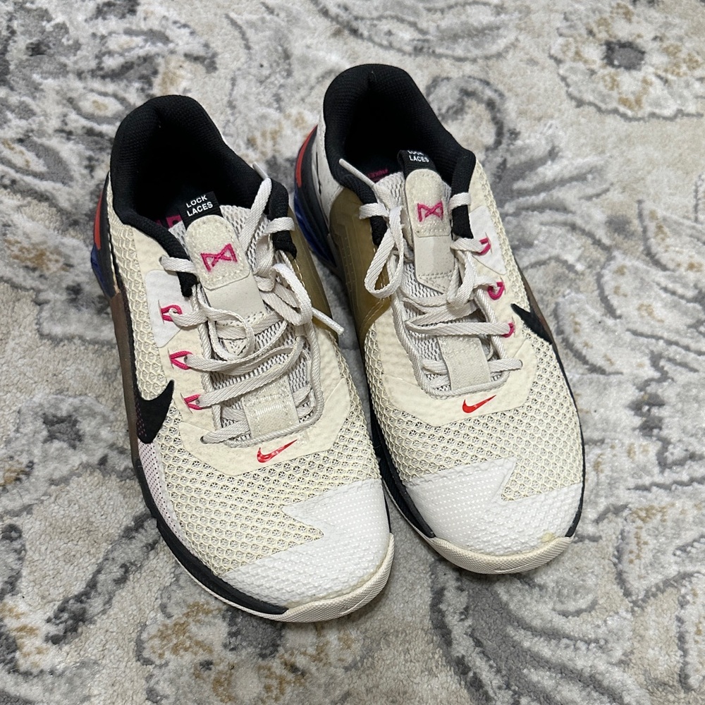 Nike Cream and Black Running Shoes with Pink Accents